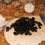 Calamari alle olive e pomodori