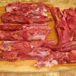 Capretto al forno con muscari