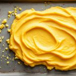 Il raffreddamento della polenta e la scolatura dei funghi