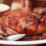 Anatra farcita con mele e uva