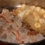 Gamberi e capesante all’aglio