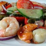 Gamberi e capesante all’aglio