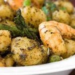 Gnocchi con asparagi e gamberetti