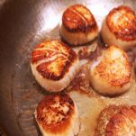 Capesante al burro e prezzemolo