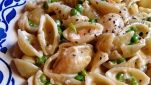 Conchiglioni con piselli e prosciutto