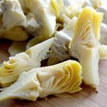 Cosce di galletto con carciofi