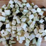 Spaghetti con coda di rospo melanzane e pomodori