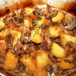 Agnello con funghi e patate
