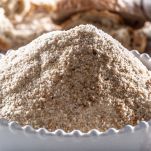 A white bowl full of breadcrumbs – Close up.