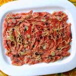 Carpaccio di salmone all’erba cipollina