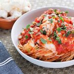 Spaghetti con pomodoro fresco e merluzzo