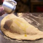 Calzoni alle cipolle ed acciughe