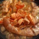 Paccheri con coda di rospo, pomodorini e bottarga grattugiata