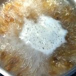 Fregola sarda, vongole, pesto e mandorle