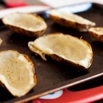 Patate farcite con prosciutto e formaggio