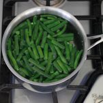 Sauté di fagiolini, piselli e pomodorini