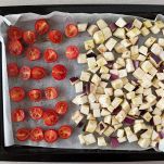Melanzane e pomodorini in teglia