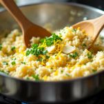 togliete il risotto dal fuoco e mantecate con il Parmigiano Reggiano
