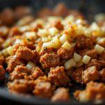 Melanzane a barchetta al forno con salsiccia
