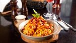 Tagliatelle con ragù di porcini
