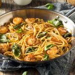 Pasta con capesante e lardo