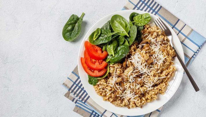 Risotto con funghi e spinaci