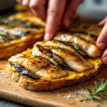 Filetti di sgombro su pane tostato