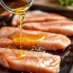 Pesce spada marinato in teglia con emulsione agrumata.