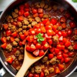 Pezzi di pomodoro che sobbollono