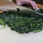 Potato wedges cooked in a pot on an induction stove. Cooking at home