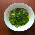 Condimento di olio d’oliva e basilico