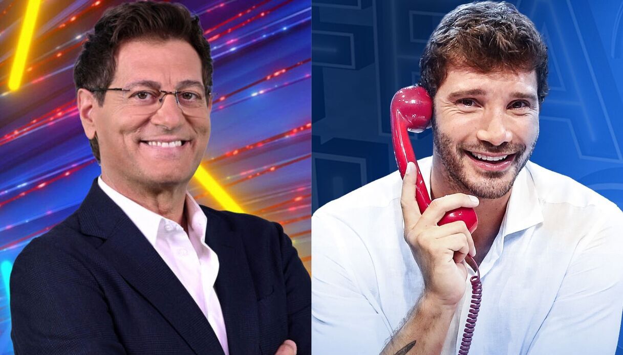 https://wips.plug.it/cips/libero.it/magazine/cms/2025/08/affari-tuoi-stefano-de-martino-enrico-papi.jpg