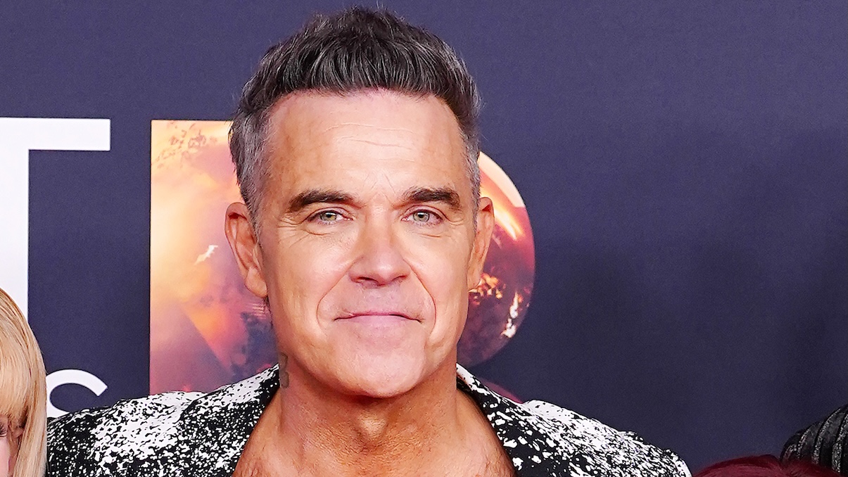 https://wips.plug.it/cips/libero.it/magazine/cms/2026/08/robbie-williams.jpg