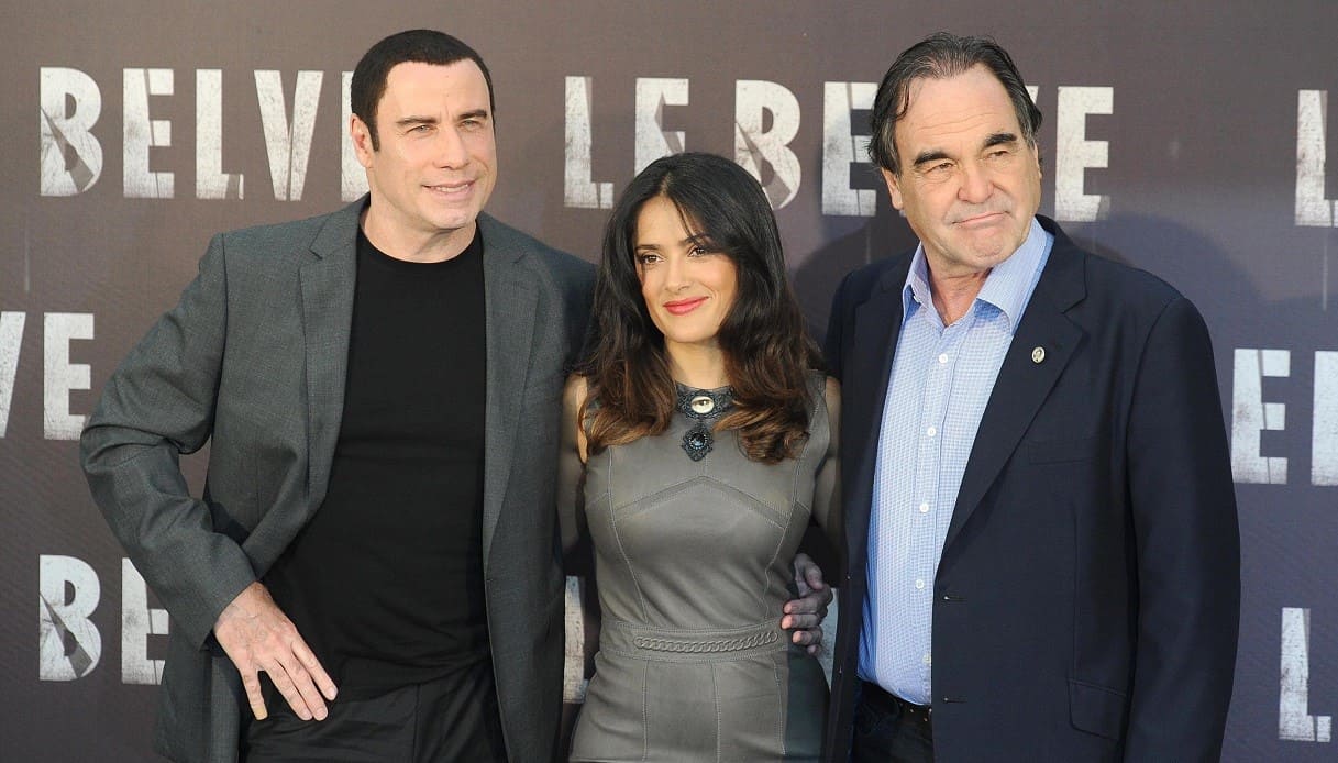 Da sinistra: John Travolta, Salma Hayek e il regista Oliver Stone alla presentazione del film.