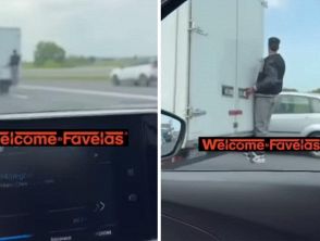 Uomo in piedi sul retro del camion in corsa sull'autostrada A14 tra Rimini e Bologna, il video è incredibile