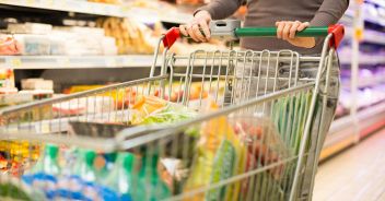 Close-up detail of a woman shopping in a supermarke