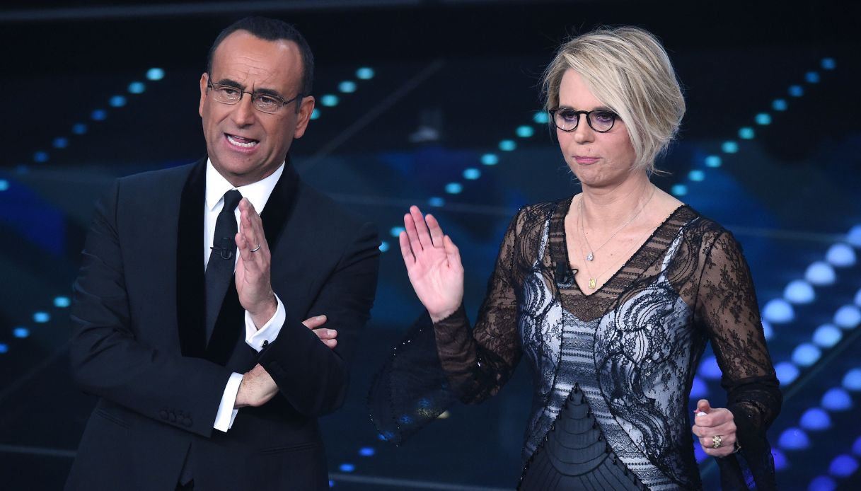 https://wips.plug.it/cips/notizie.virgilio.it/cms/2025/02/carlo-conti-sanremo-2025-maria-de-filippi.jpg