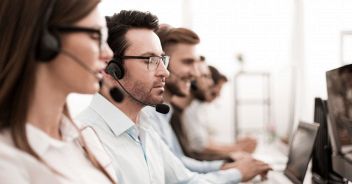 close up.background image of call center employees in the workplace