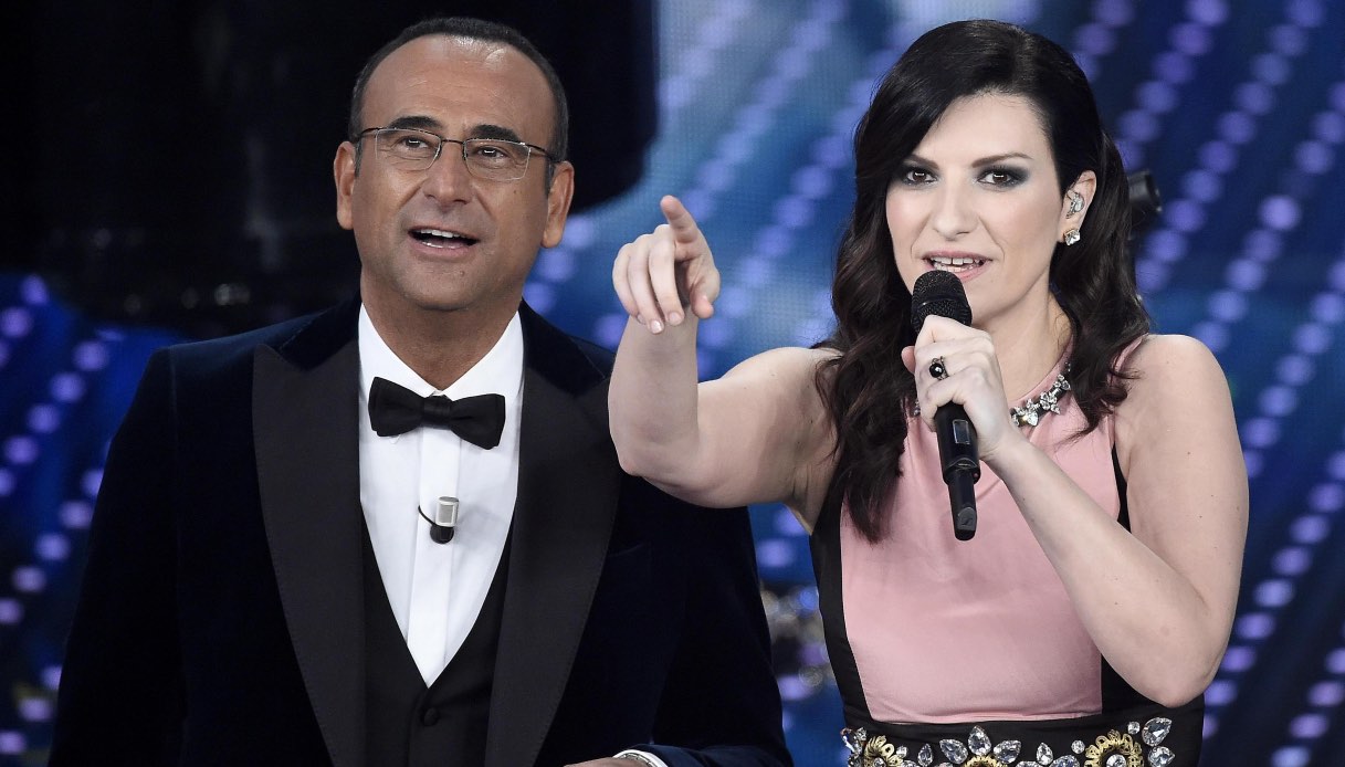 https://wips.plug.it/cips/notizie.virgilio.it/cms/2026/01/laura-pausini-sanremo-carlo-conti.jpg