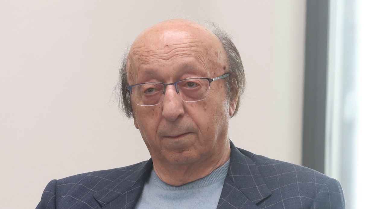https://wips.plug.it/cips/notizie.virgilio.it/cms/2026/05/prete-luciano-moggi-funerale-moglie-monticiano.jpg