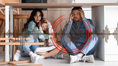 famiglia che si ripara sotto un tavolo durante un terremoto