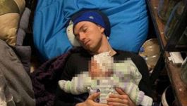 La foto che scuote l'Europa: biathleta Tsymbal e il figlio nel rifugio