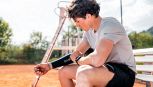 Supporto muscolare sportivo: cos'è, come funziona e perché le fasce compressive non bastano più