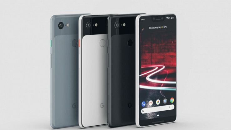 Quattro smartphone in fila su sfondo grigio