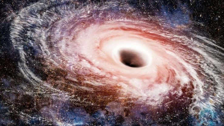 Scoperto un buco nero enorme, si espande a una velocità impressionante e risucchia tutto