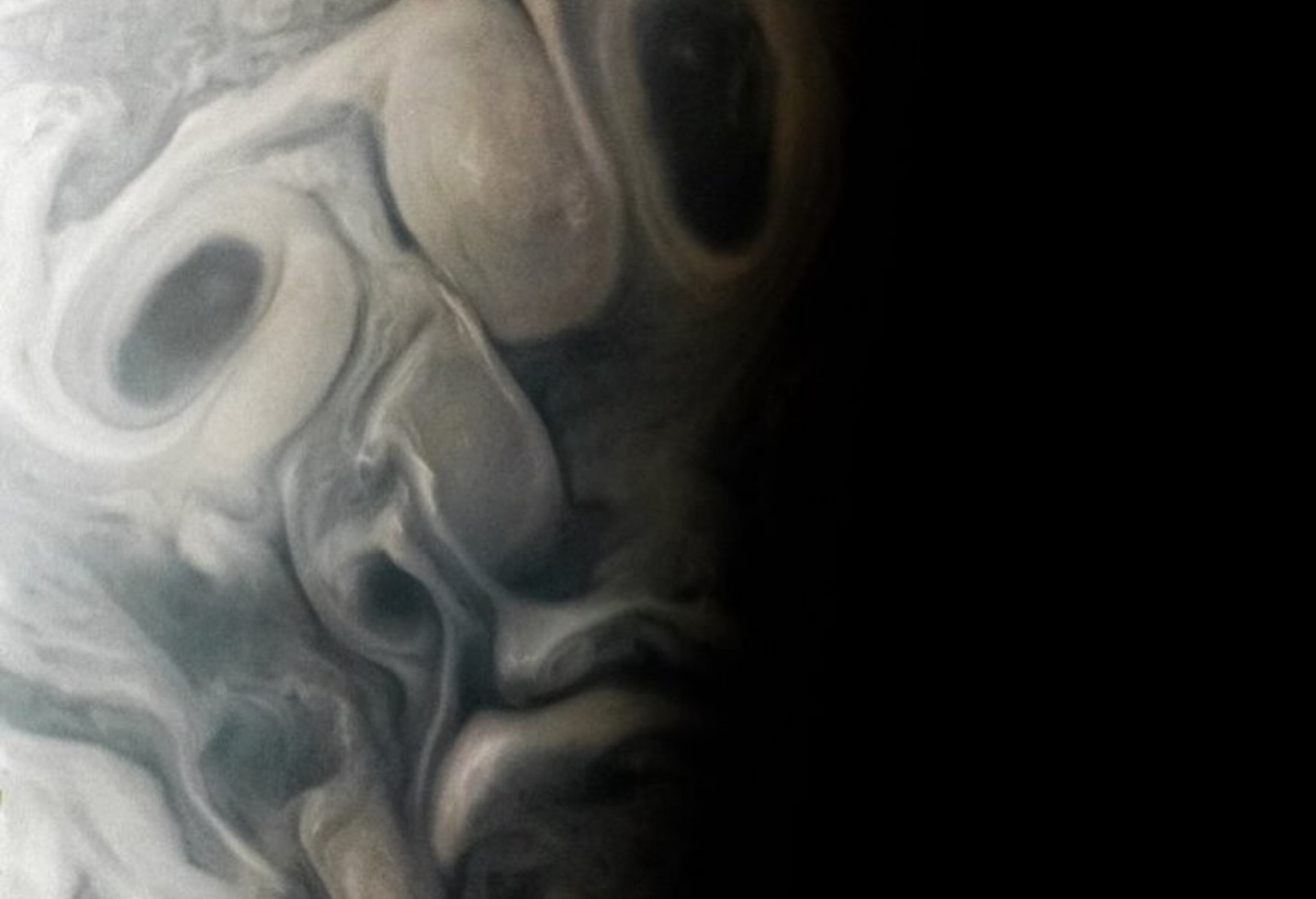 A face in space between the clouds of Jupiter