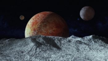 Superficie rocciosa di fronte a pianeti nello Spazio