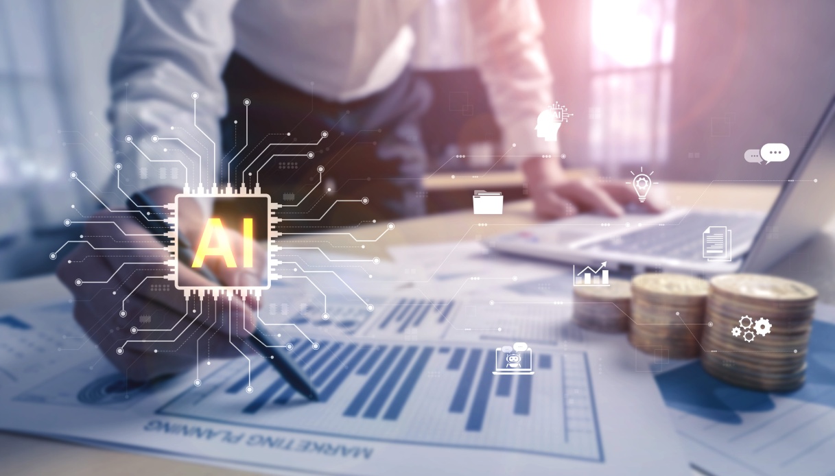https://wips.plug.it/cips/tecnologia/cms/2026/05/grafici-denaro-e-ai.jpg