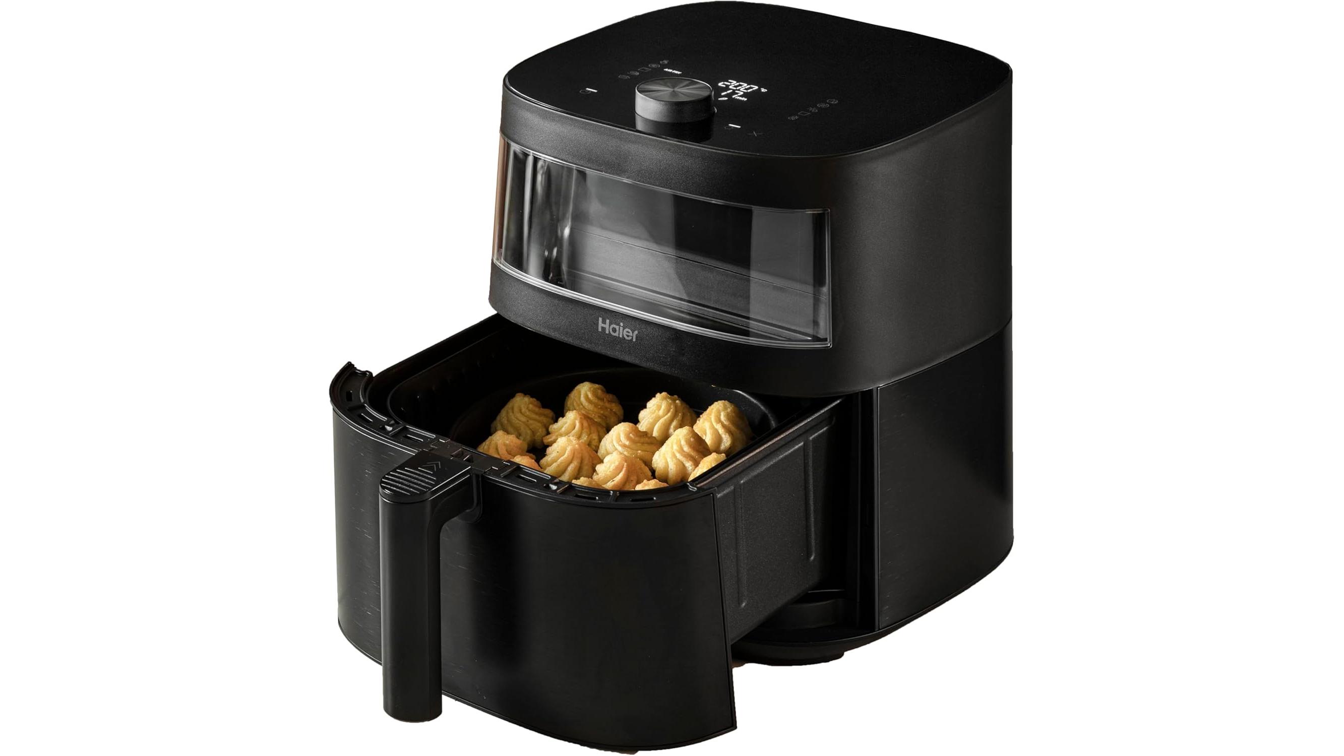 https://wips.plug.it/cips/tecnologia/cms/2026/06/friggitrice-aria-haier-serie-5-nera-7l.jpg