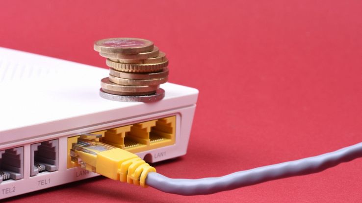 Router con monetine appoggiate sopra